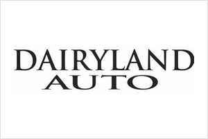 A black and white photo of dairyland auto